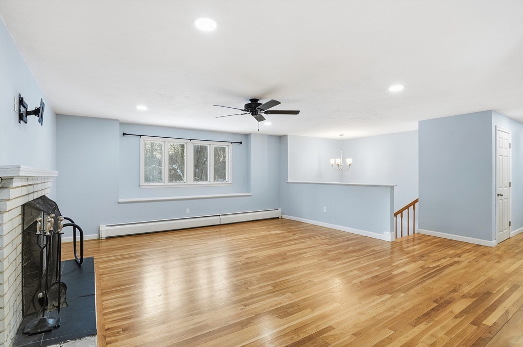 36 Hillandale Road Ashburnham, MA 01430 - Photo 5 of 31 a view of empty room with wooden floor and fan
