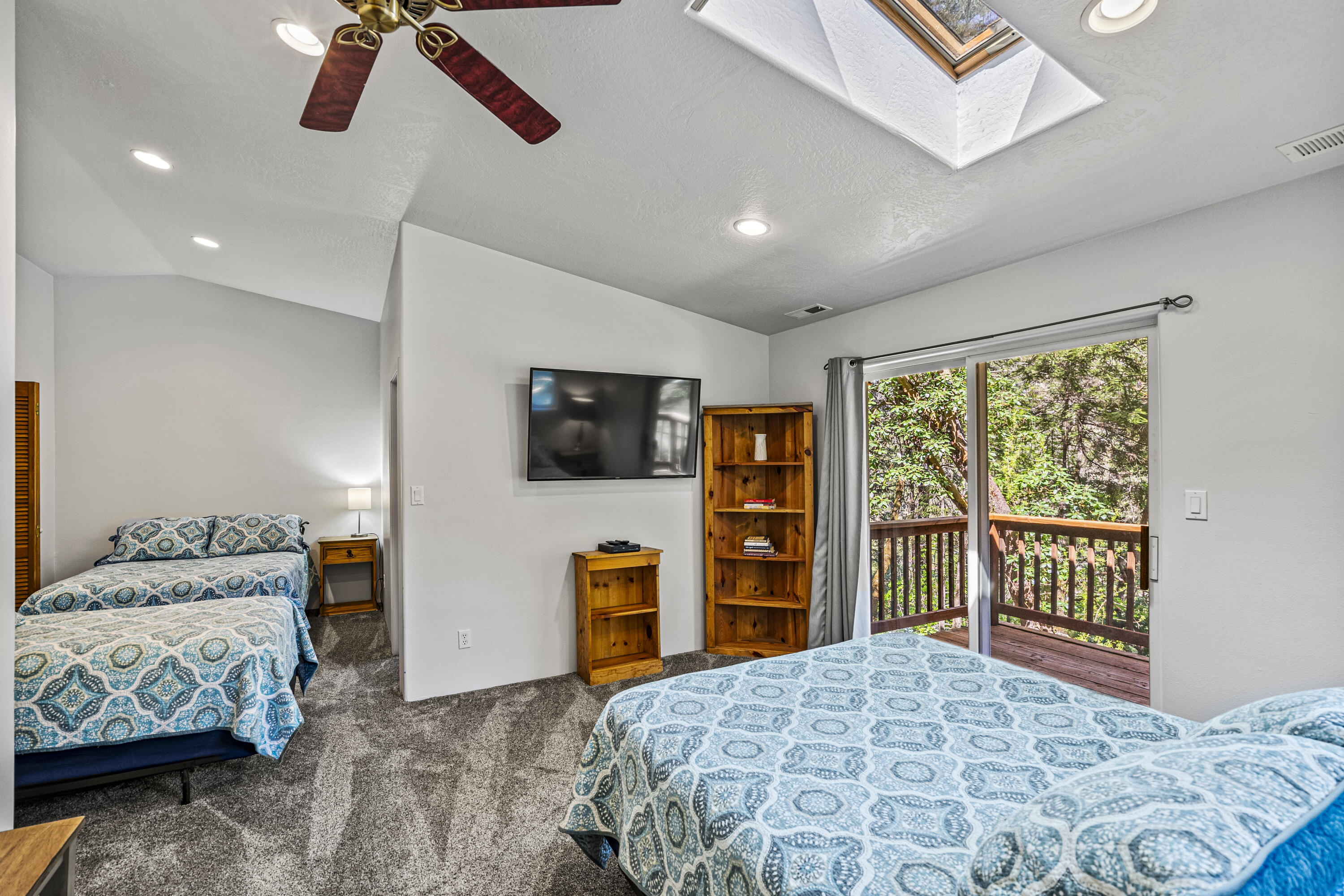 11744 Galice Road Merlin, OR 97532 - Photo 53 of 74 a bedroom with a bed and a television