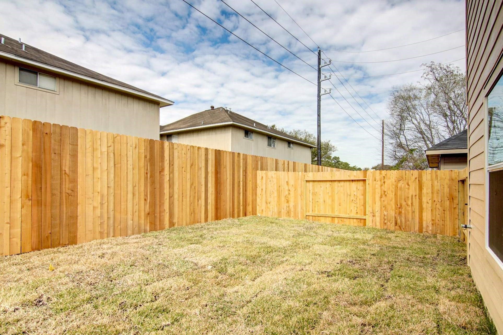 2435 Gibbs Bend Court Houston, TX 77073 - Photo 15 of 16 a view of a house with a backyard of the house