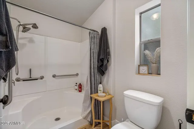 a bathroom with a sink a toilet and a bathtub