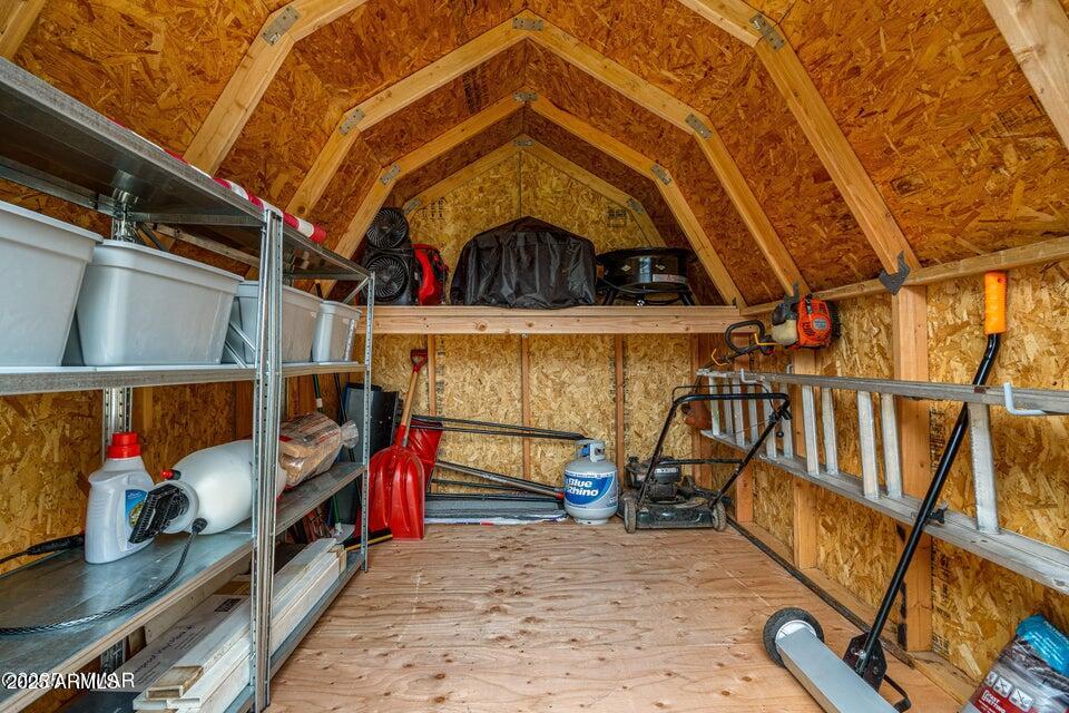 1590 Peterson Road Lakeside, AZ 85929 - Photo 30 of 41 a view of an empty room with wooden floor