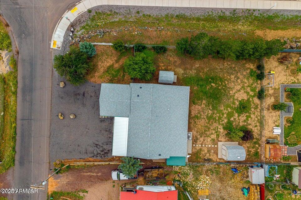 1590 Peterson Road Lakeside, AZ 85929 - Photo 36 of 41 an aerial view of residential house with pool and yard