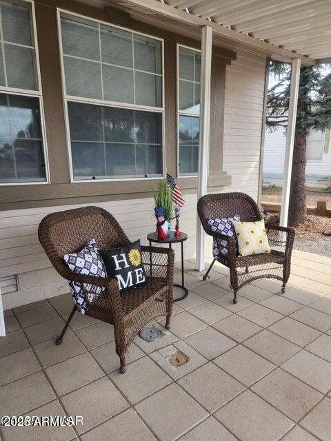 1590 Peterson Road Lakeside, AZ 85929 - Photo 41 of 41 a living room with furniture and a potted plant