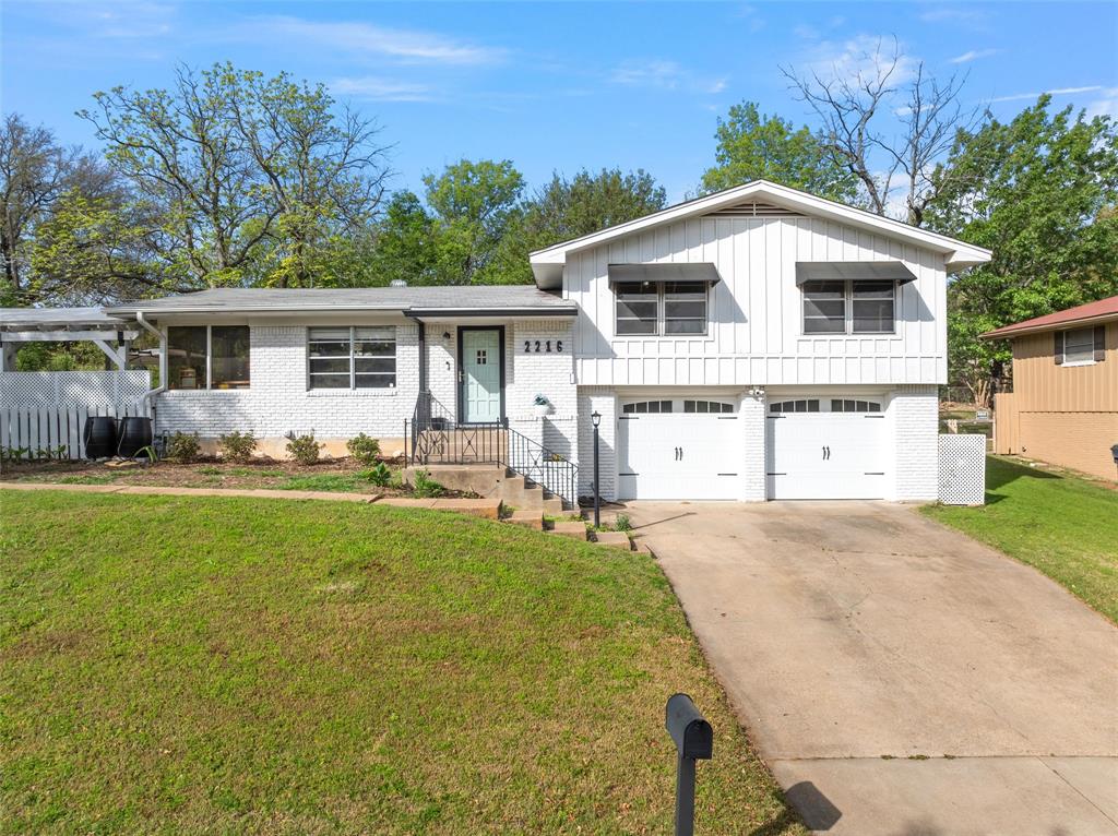 2216 Hermanson Drive Waco, TX 76710 - Photo 2 of 39 a front view of a house with yard patio and green space
