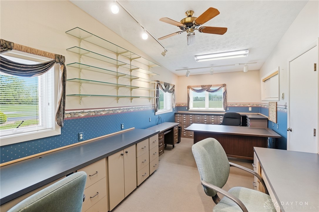 5669 O Neall Road Waynesville, OH 45068 - Photo 64 of 72 This versatile workspace features abundant shelving and a functional layout, ideal for productivity.