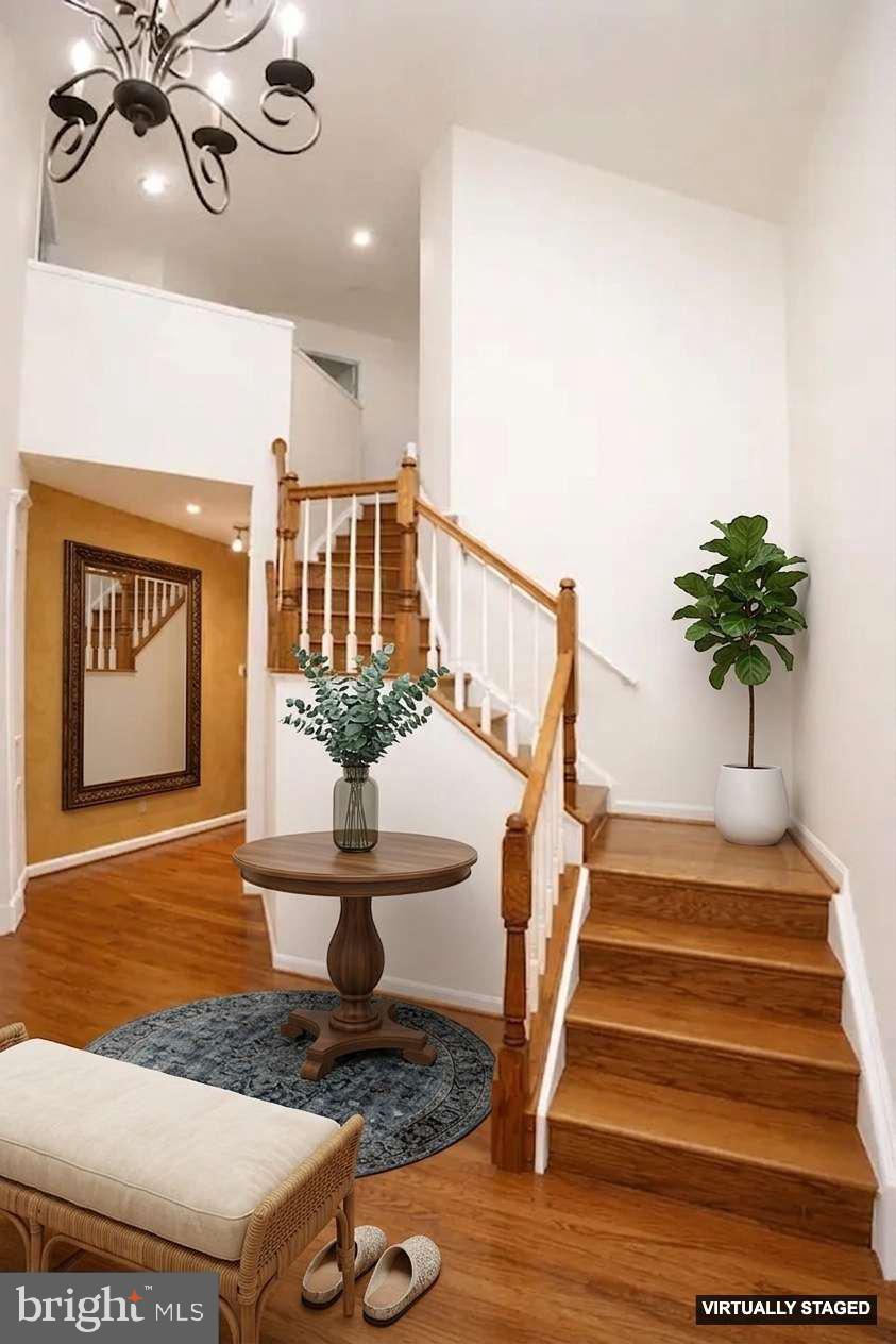 2448 Leyland Ridge Road Herndon, VA 20171 - Photo 17 of 32 Inviting entryway with elegant staircase.