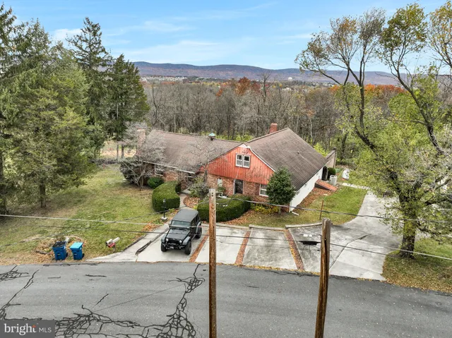 a picture of a room with a white wall and a picture