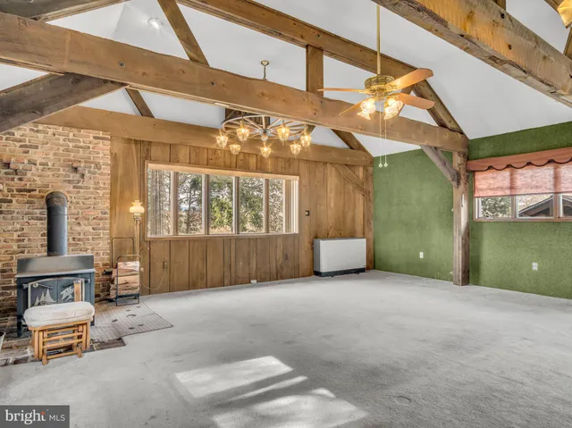 a view of a bathroom with tub and sink