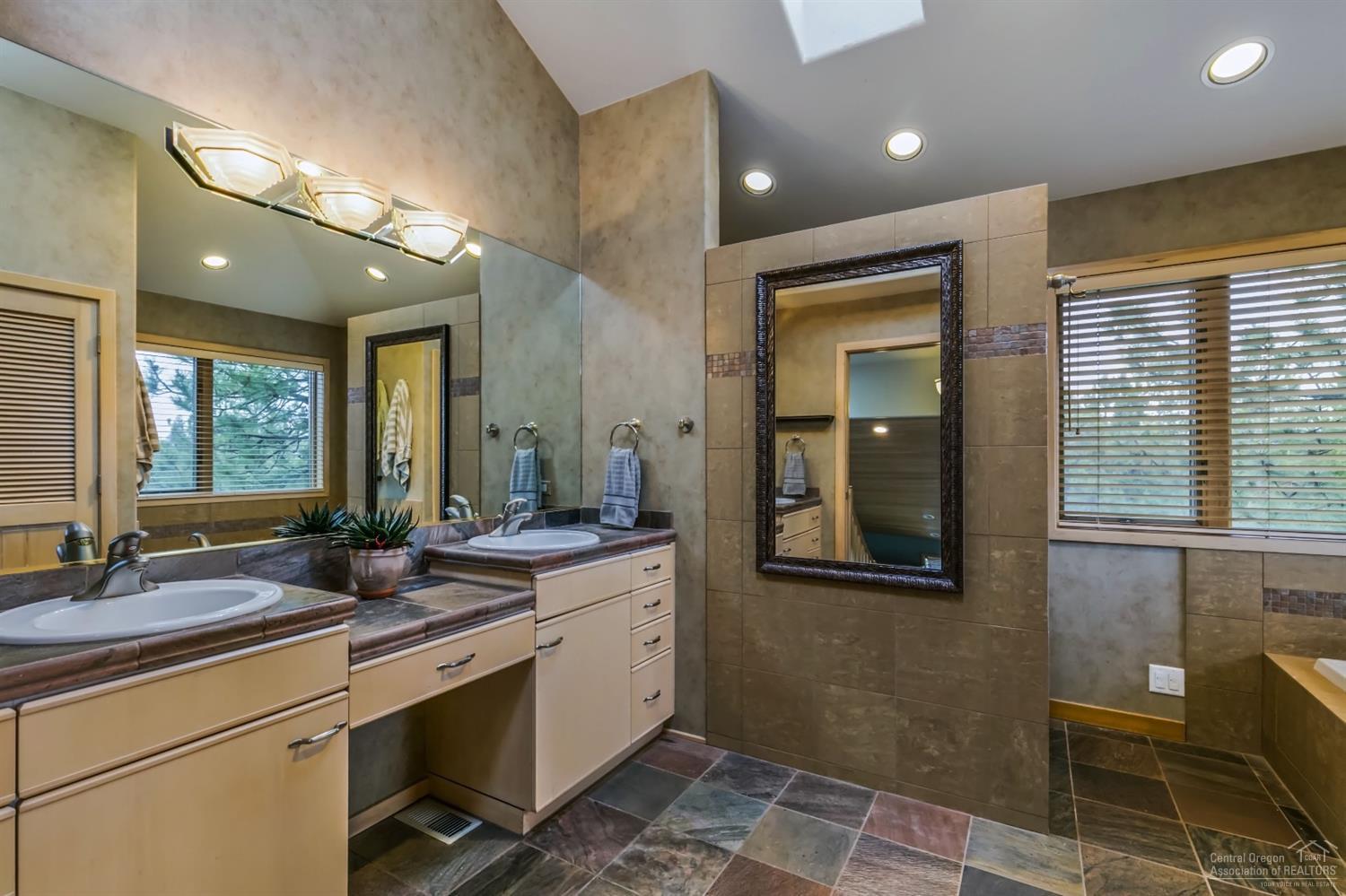 19701 Sunshine Way Bend, OR 97702 - Photo 20 of 25 This custom master suite has a walk in s