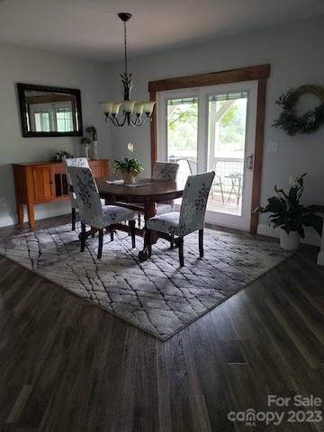 204 Mountain Spring Lane Canton, NC 28716 - Photo 5 of 18 a view of a dining room with furniture window and wooden floor