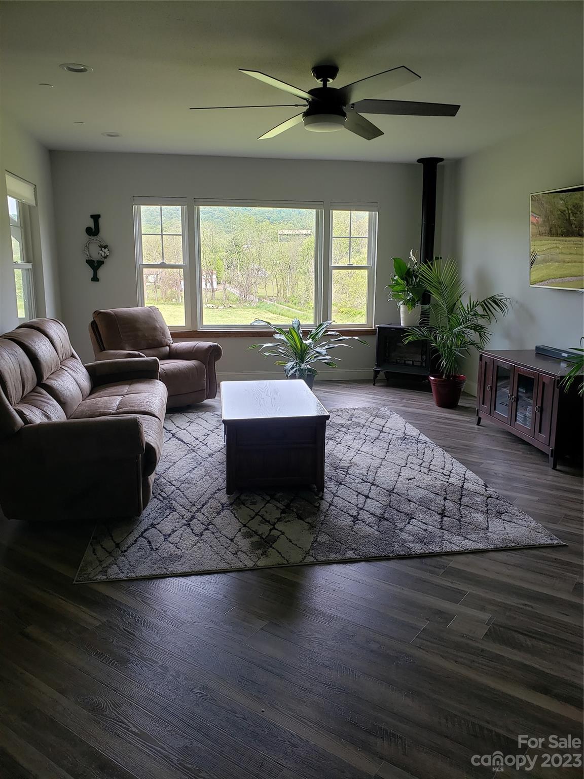 204 Mountain Spring Lane Canton, NC 28716 - Photo 6 of 18 a living room with furniture and a large window