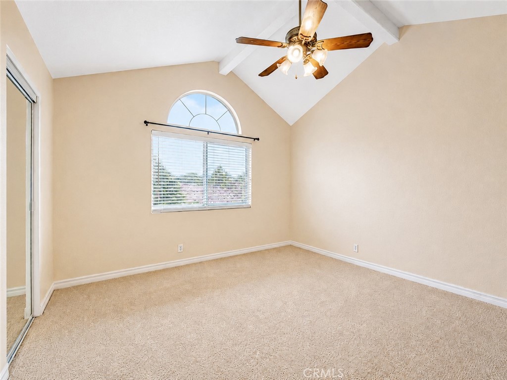 2811 North Roxbury Street Orange, CA 92867 - Photo 15 of 22 an empty room with a window and a ceiling fan
