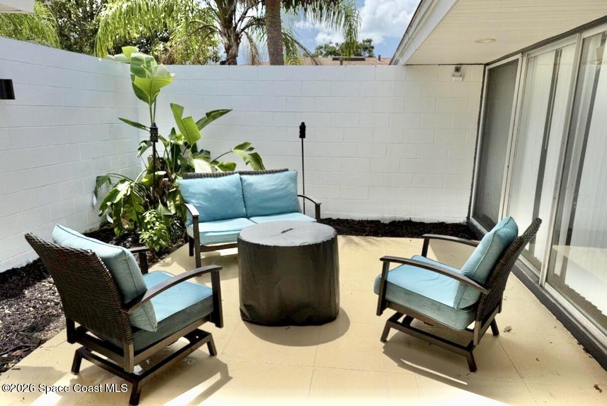 938 Brunswick Lane Rockledge, FL 32955 - Photo 17 of 21 Frnt courtyard off dining w furn.