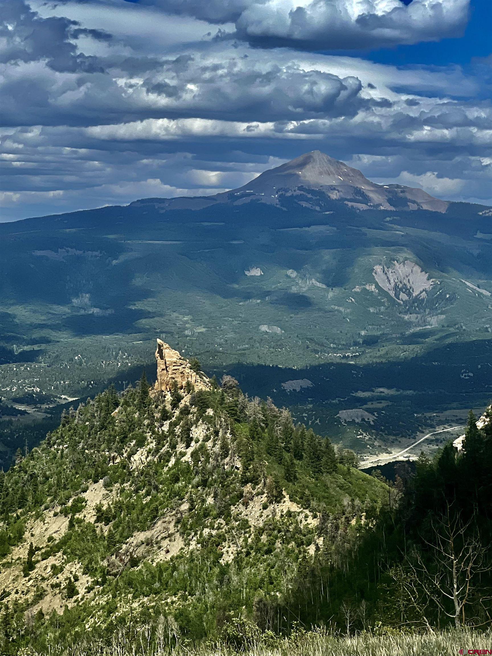 0 Groundhog Reservoir Road, Unit POND ROCK ELK & CATTLE Norwood, CO 81423 - Photo 35 of 35 a view of a lake from a yard