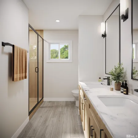 a bathroom with a sink a mirror and a shower