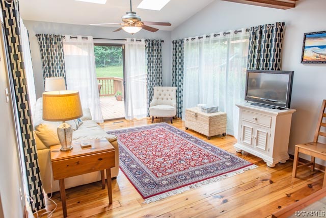 8927 Rustic Road Richmond, VA 23235 - Photo 5 of 18 a living room with furniture and a flat screen tv