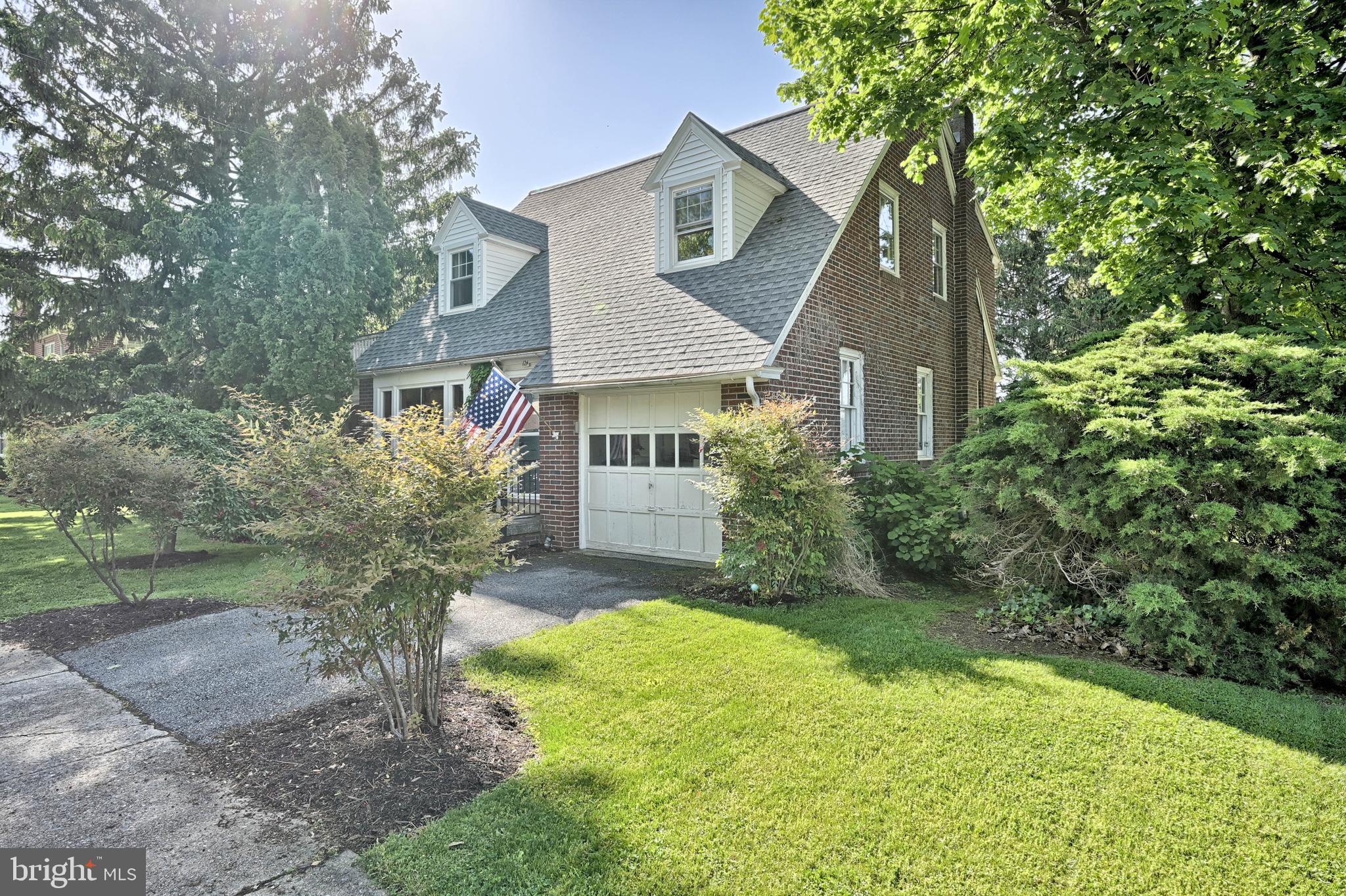 124 Market Street Lititz, PA 17543 - Photo 27 of 35 a front view of house with yard and trees