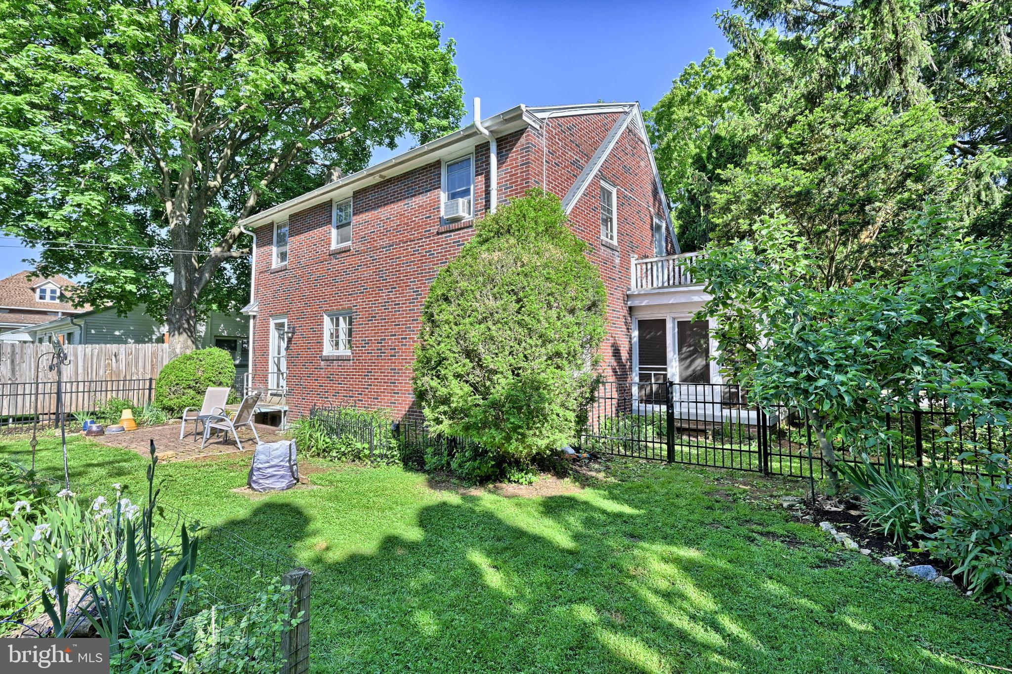 124 Market Street Lititz, PA 17543 - Photo 30 of 35 a view of a house with a yard and sitting area