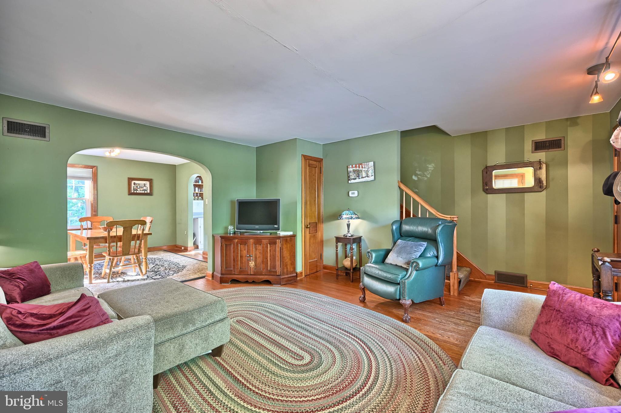124 Market Street Lititz, PA 17543 - Photo 5 of 35 a bedroom with furniture and a couch