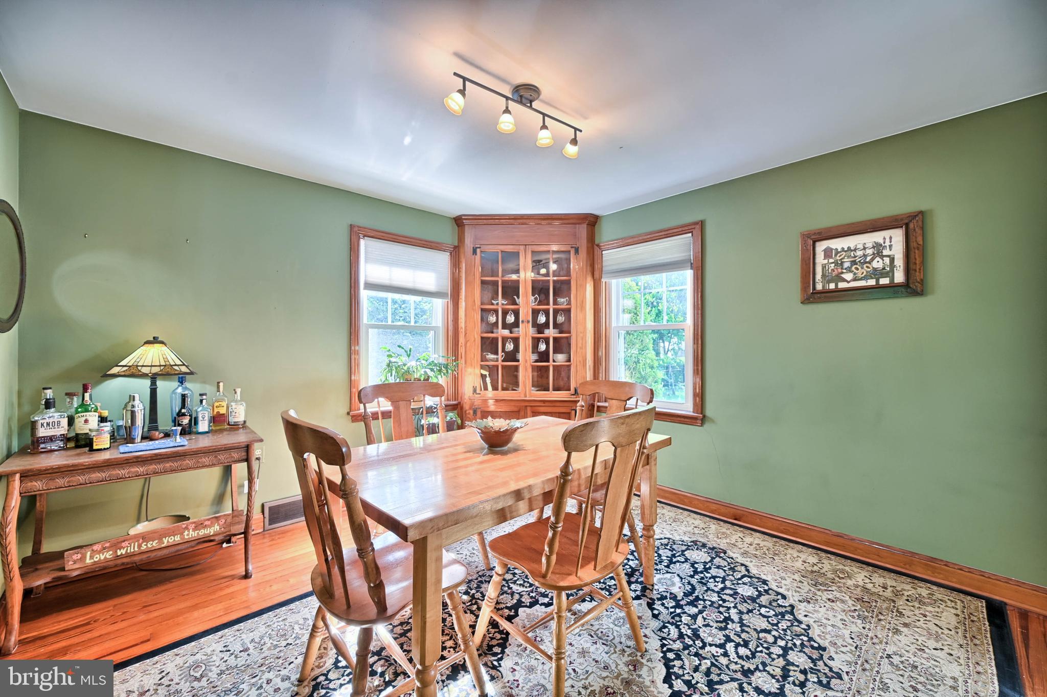 124 Market Street Lititz, PA 17543 - Photo 6 of 35 a view of a dining room with furniture a rug and wooden floor