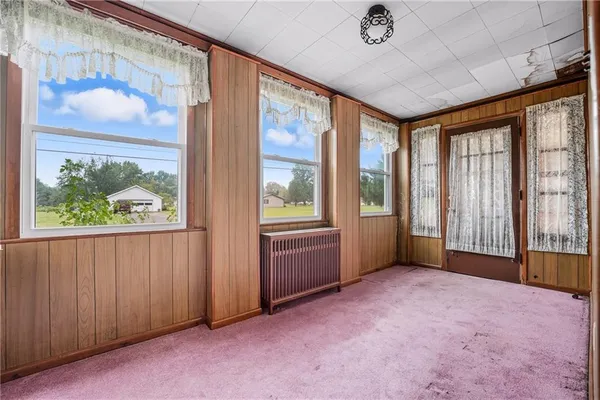 an empty room with windows