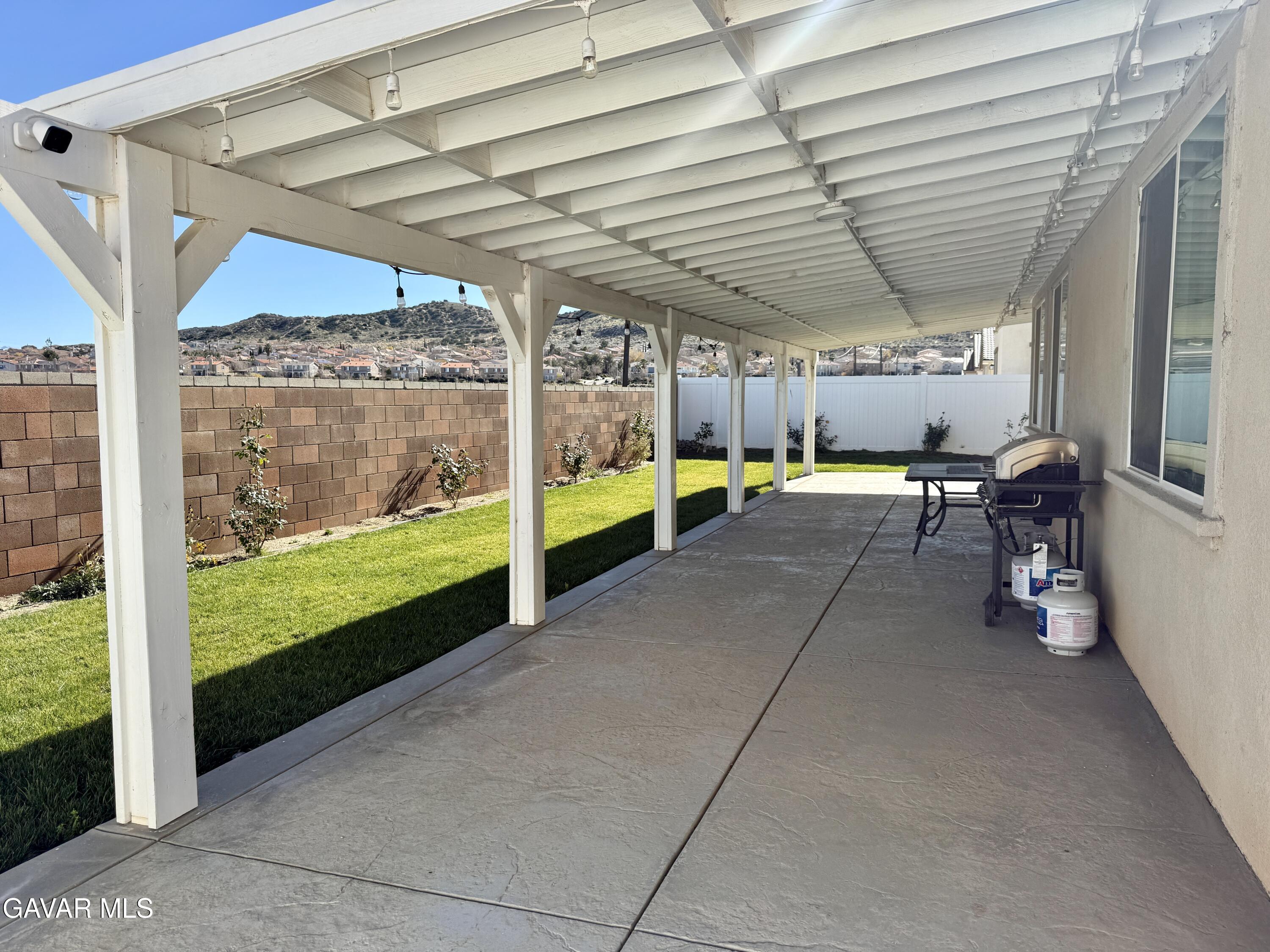 38902 Malva Rosa Drive Palmdale, CA 93551 - Photo 11 of 12 a view of an empty room with furniture