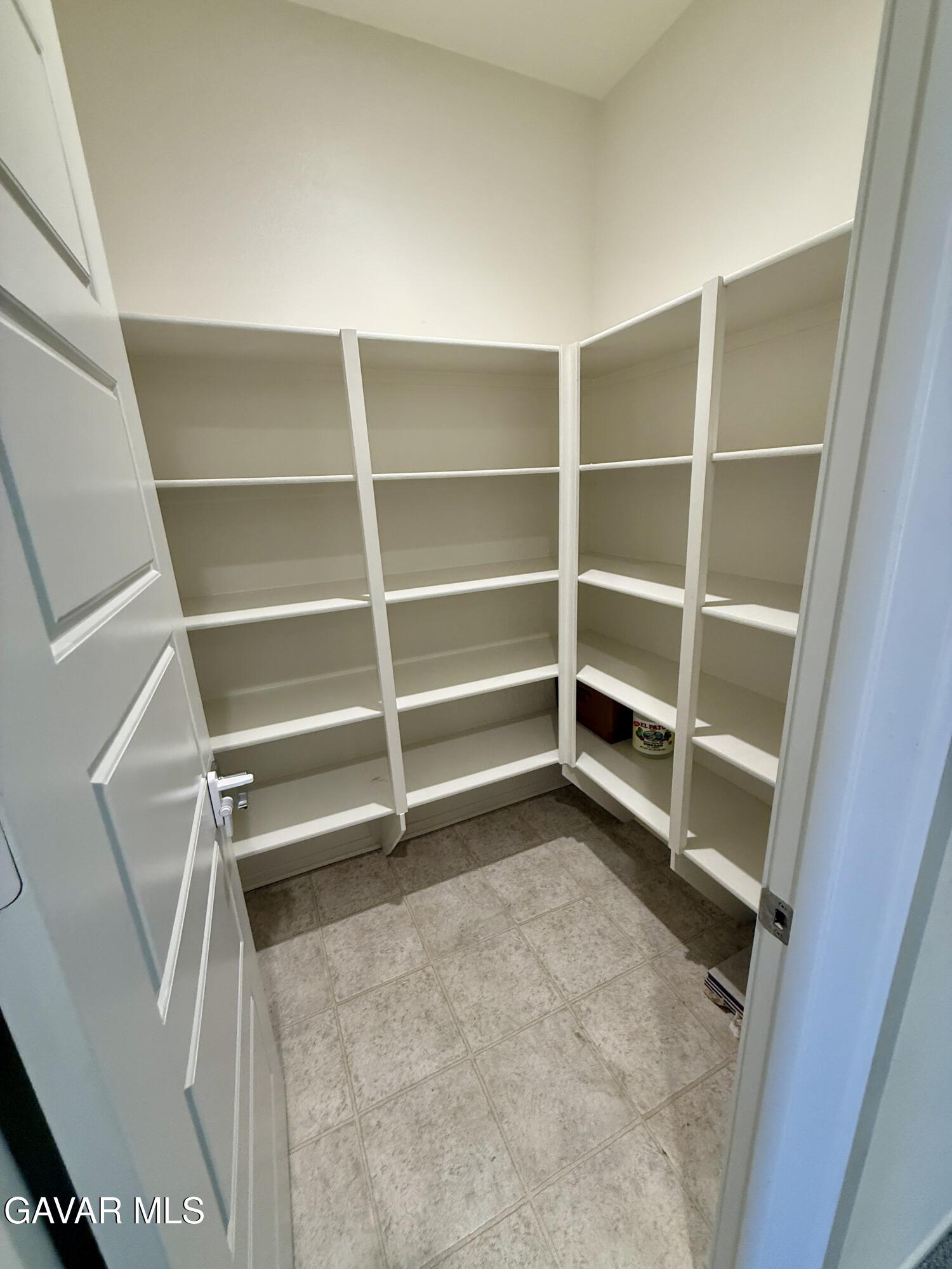 38902 Malva Rosa Drive Palmdale, CA 93551 - Photo 5 of 12 a view of an empty walk in closet