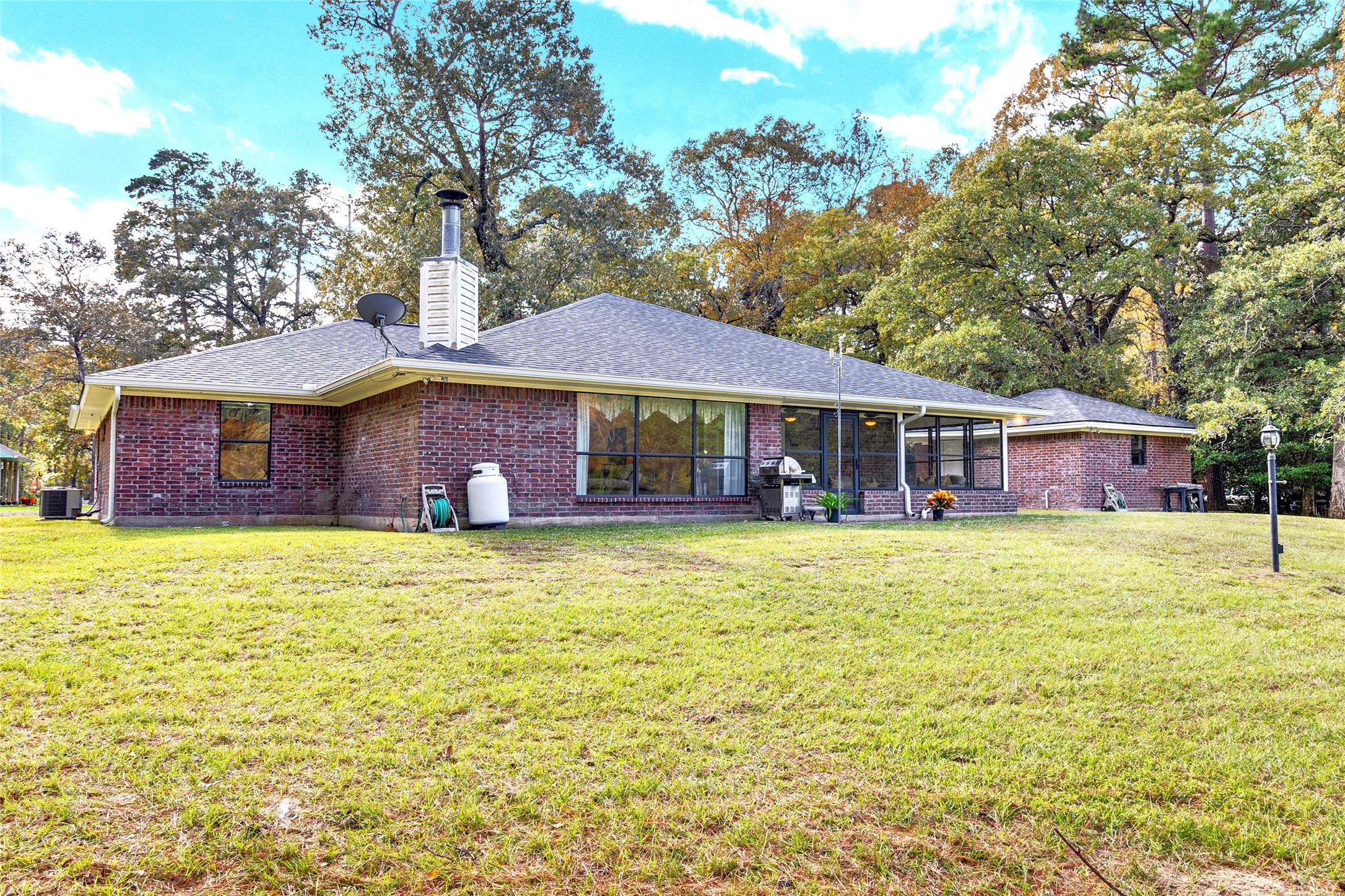 184 Birch Trinity, TX 75862 - Photo 10 of 50 Back of Home - Glass Sunroom overlooking this amazing Setting