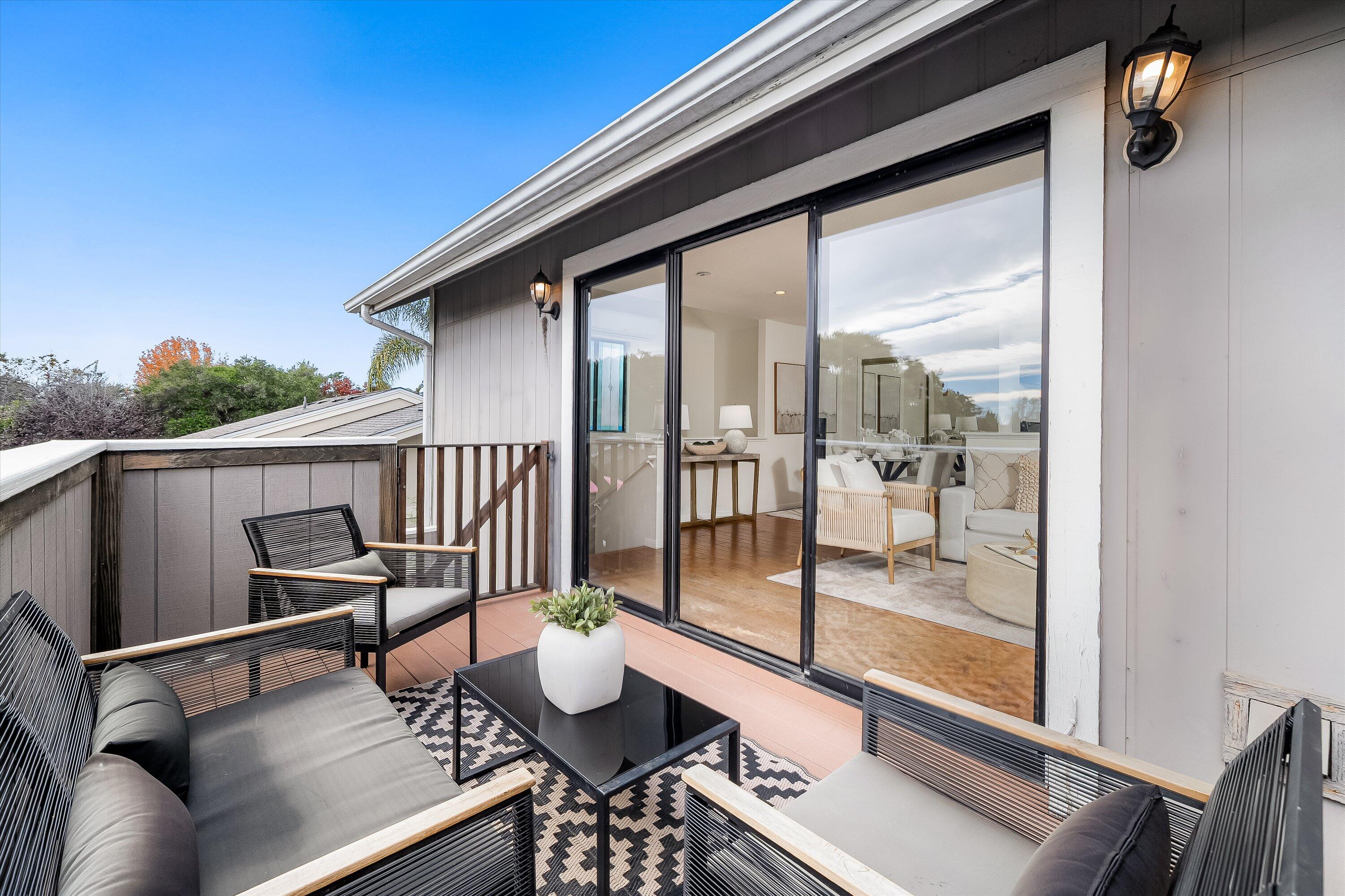 4013 Invierno Drive, Unit B Santa Barbara, CA 93110 - Photo 12 of 15 a view of a balcony dining area with furniture