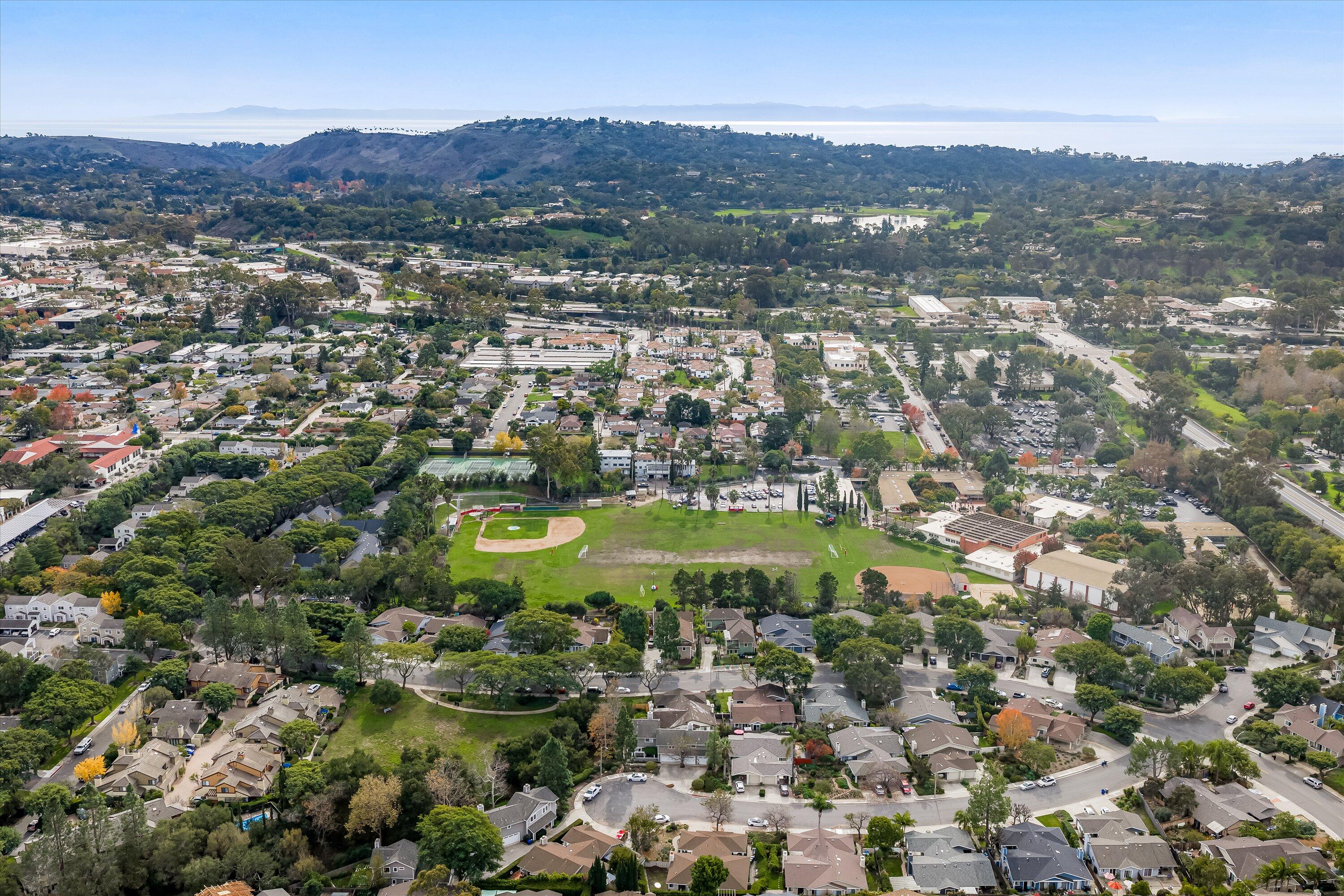 4013 Invierno Drive, Unit B Santa Barbara, CA 93110 - Photo 15 of 15 an aerial view of residential houses with outdoor space and trees
