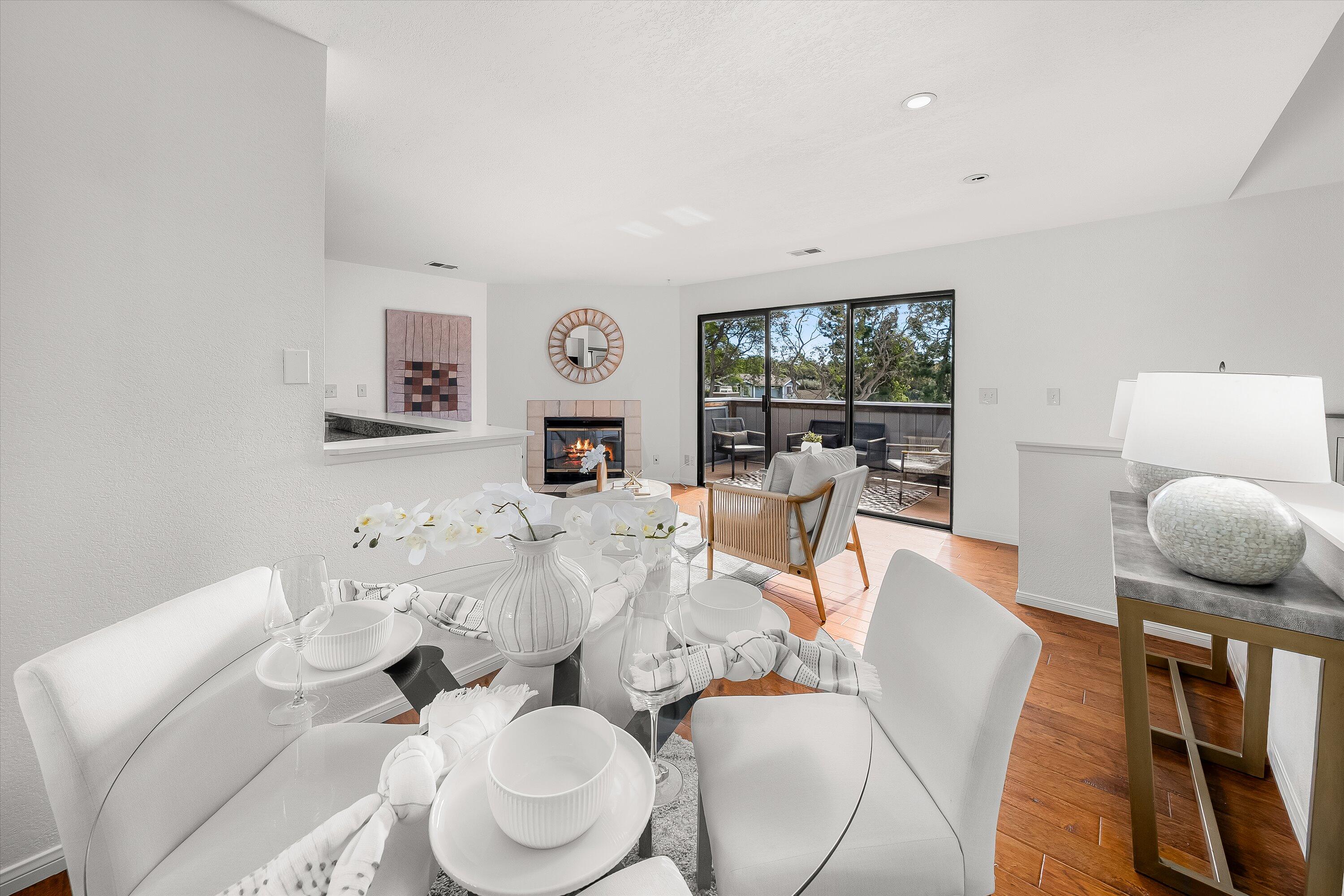 4013 Invierno Drive, Unit B Santa Barbara, CA 93110 - Photo 6 of 15 a living room with furniture and a large window