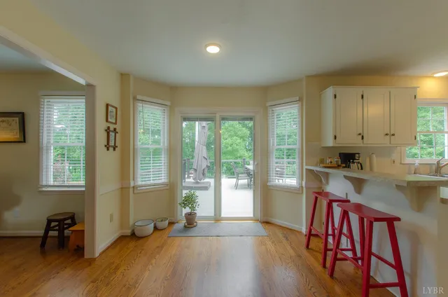 a view of walk in closet with clothes