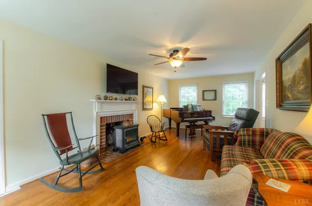 a bedroom with two beds and painted walls