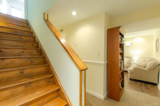 a view of a backyard with swimming pool