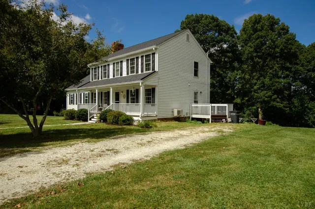 a view of a house with a big yard