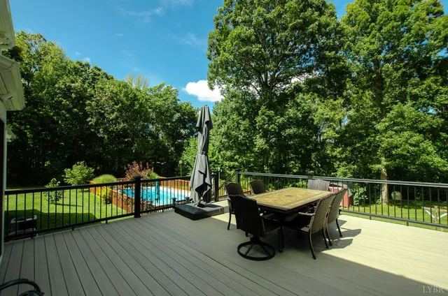 a view of a wooden fence with a bench