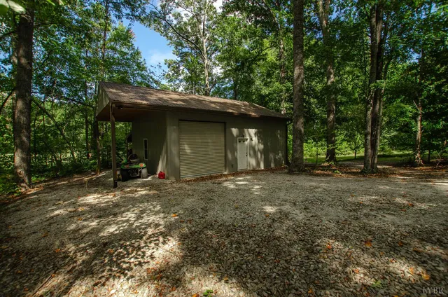 a kitchen that has a lot of cabinets in it and a window