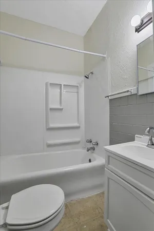 a bathroom with a sink and a toilet