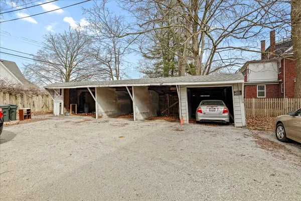 a view of a car parked in front of a building