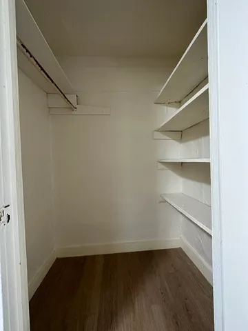 a view of an empty walk in closet