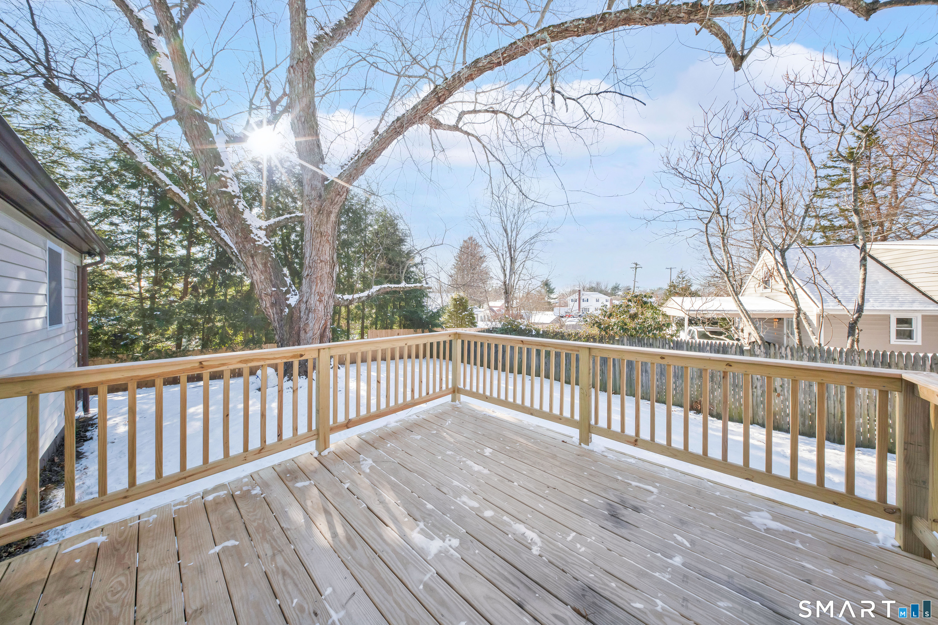 23 Bancroft Road Vernon, CT 06066 - Photo 19 of 20 a view of balcony with wooden floor and fence