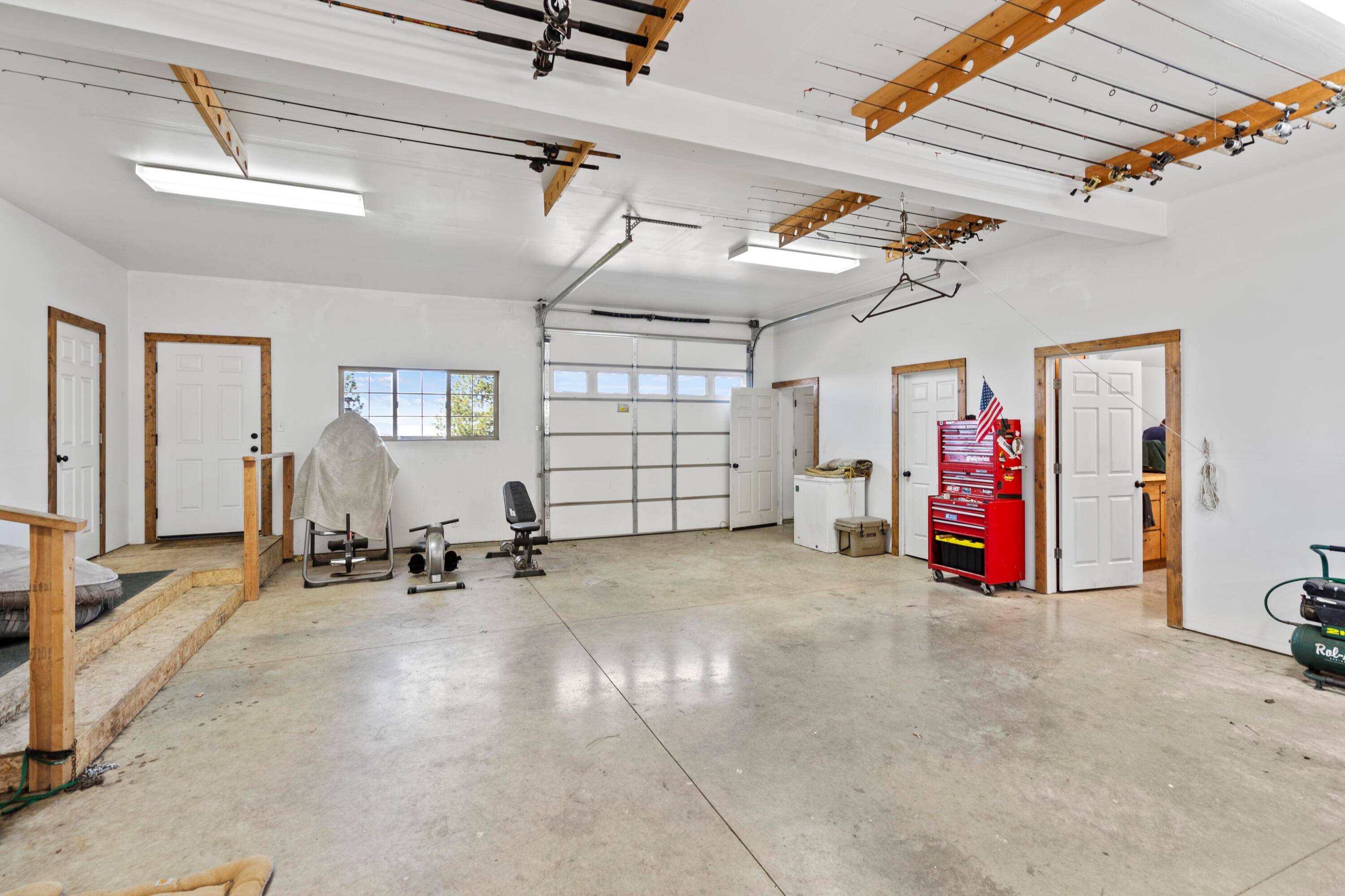 5039 East Antelope Road Eagle Point, OR 97524 - Photo 23 of 59 attached garage with gun room, canning kitchen, half bath, cool storage room and pull thru garage