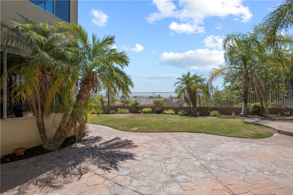 a view of a yard and entertaining space
