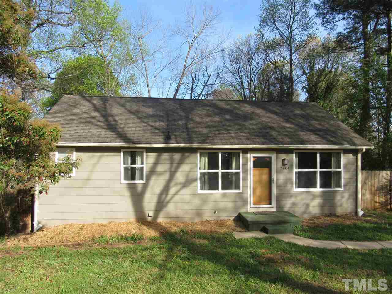 7404 Archer Circle Raleigh, NC 27615 - Photo 1 of 25 a view of house with backyard