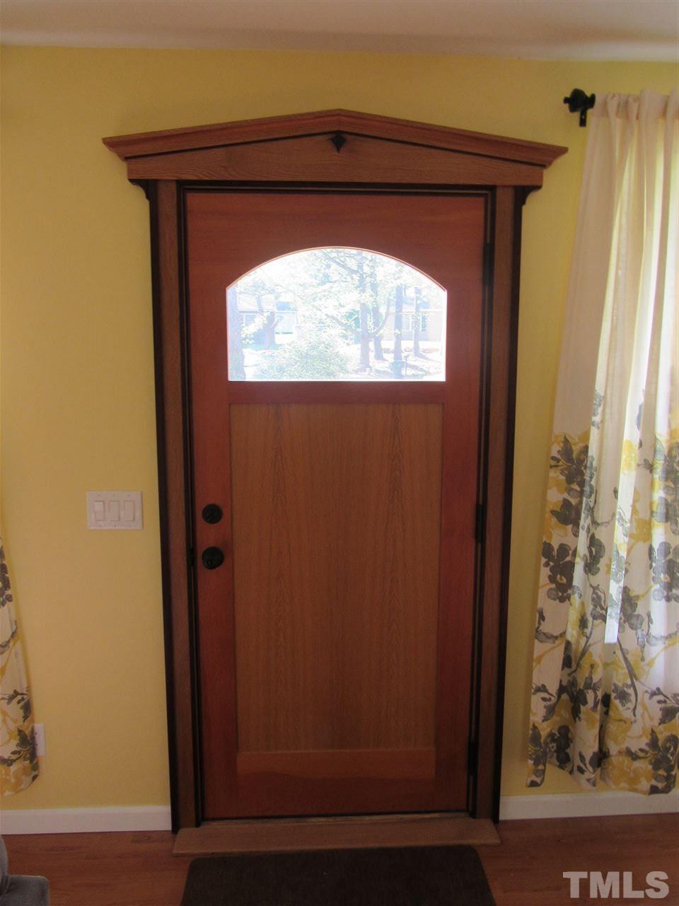 7404 Archer Circle Raleigh, NC 27615 - Photo 2 of 25 a view of a small door