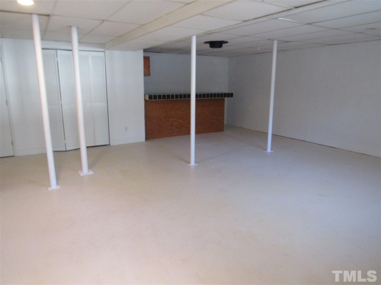 7404 Archer Circle Raleigh, NC 27615 - Photo 19 of 25 a view of room with walk in closet