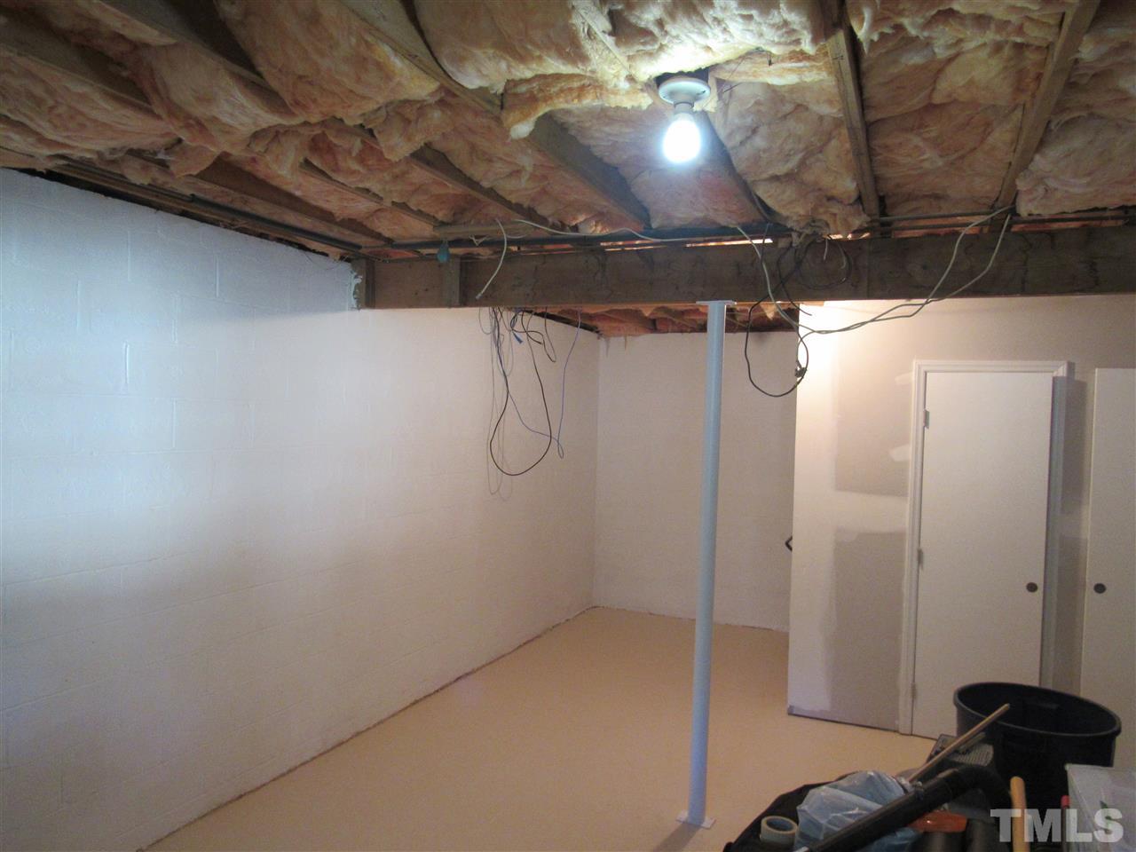 7404 Archer Circle Raleigh, NC 27615 - Photo 21 of 25 a view of a room with racks on the wall
