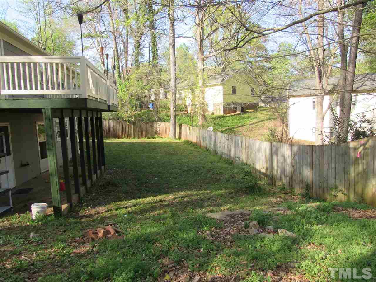 7404 Archer Circle Raleigh, NC 27615 - Photo 22 of 25 a view of a entrance gate of the house and trees