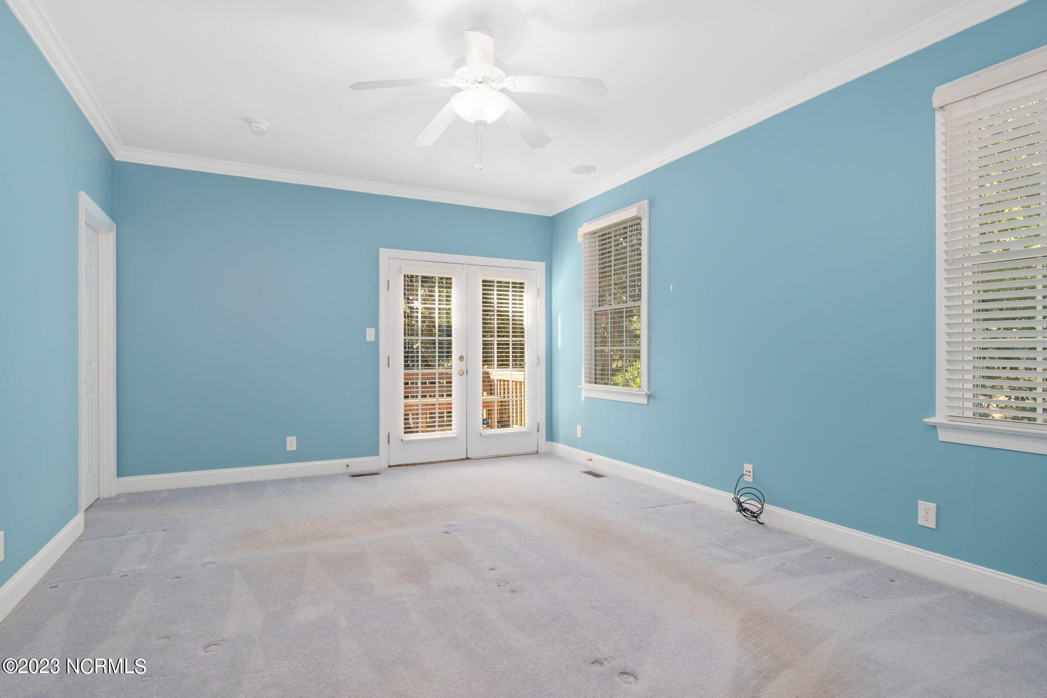 575 Coral Ridge Road Pine Knoll Shores, NC 28512 - Photo 22 of 73 Deck access from primary suite