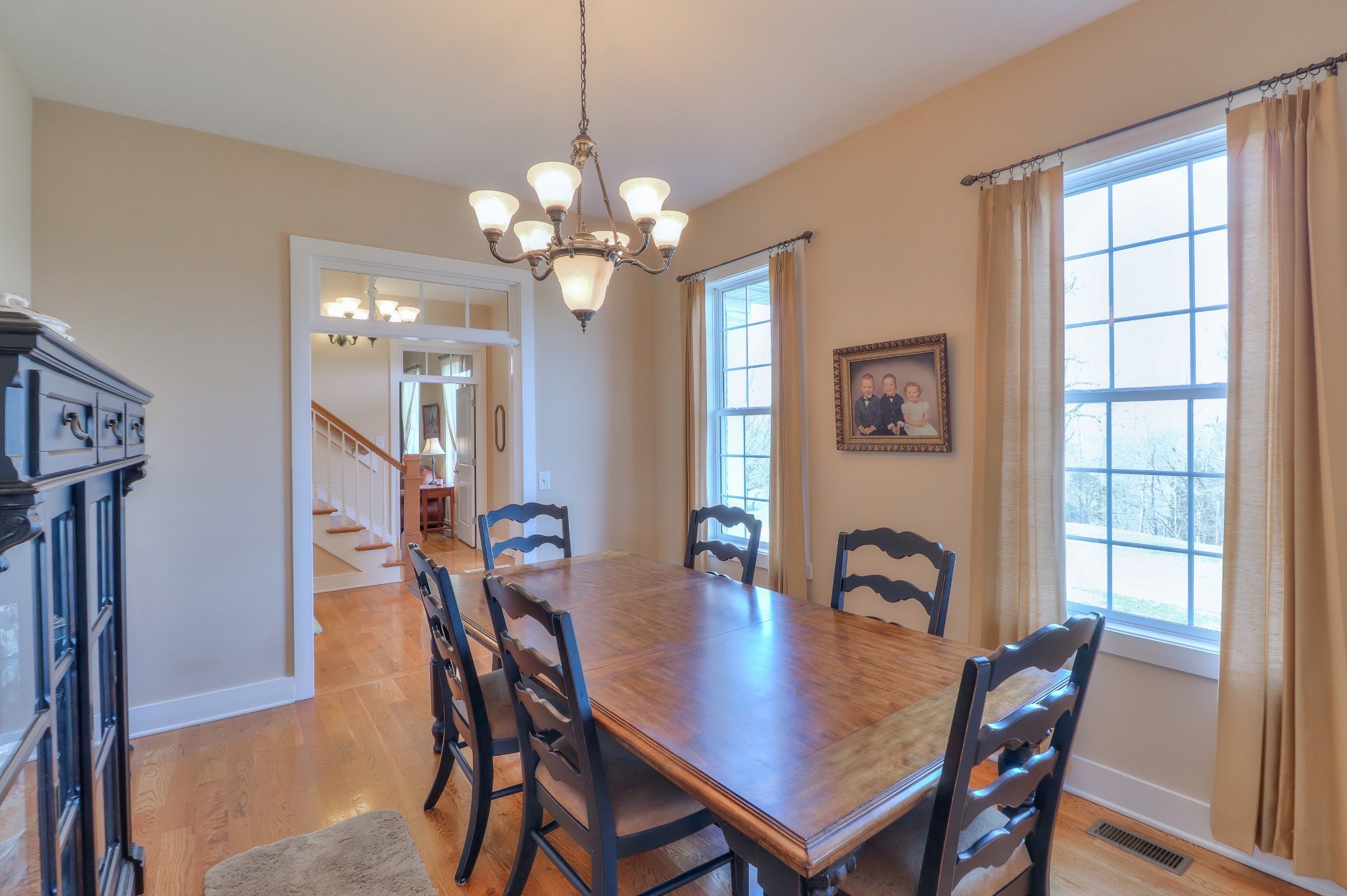 1298 Berea Church Road Lebanon, TN 37087 - Photo 13 of 50 a view of a dining room with furniture window and wooden floor